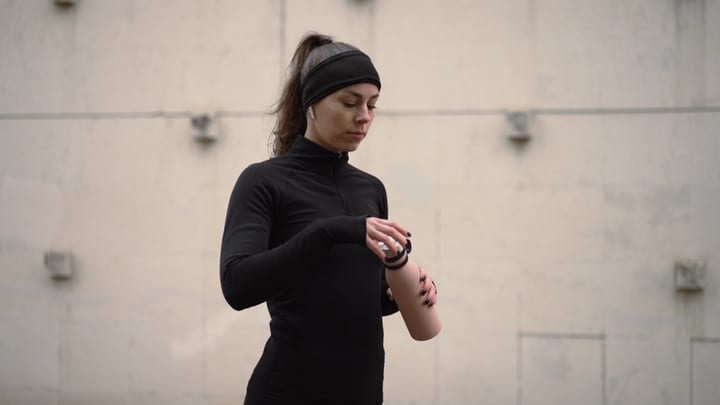 A Focused Fitness Enthusiast Embracing Her Routine