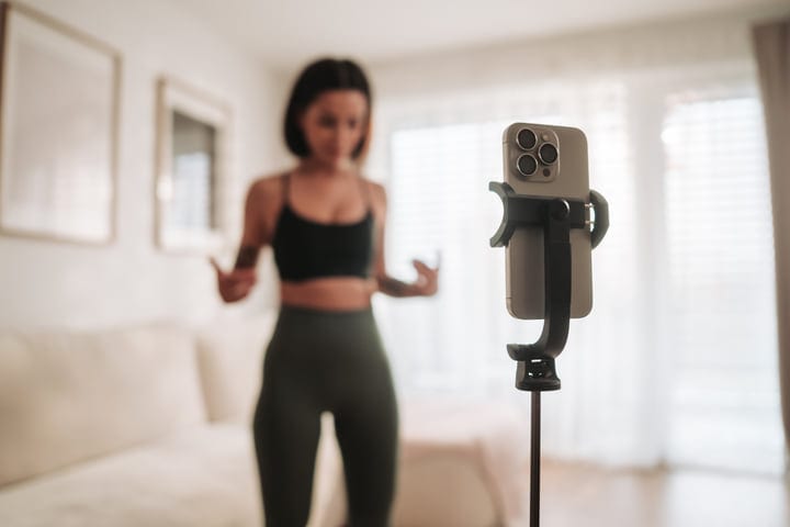 Woman Records Home Workout Video In Her Bright Living Room