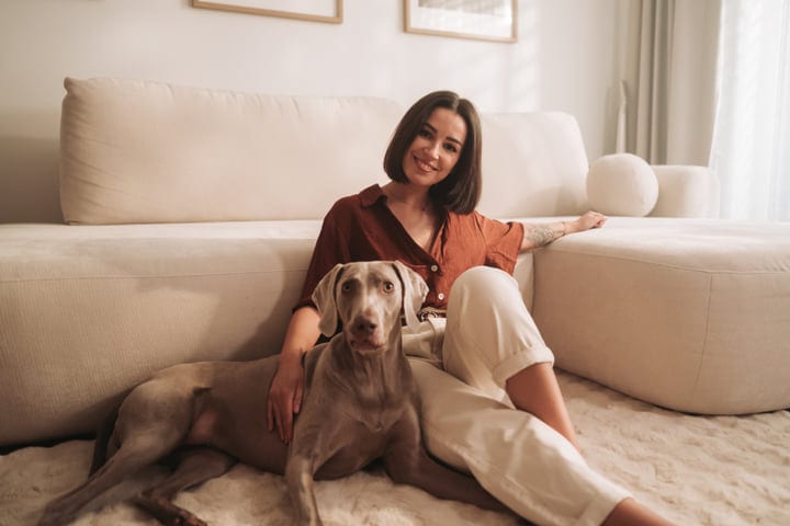 Morning Bliss: A Woman's Serene Moment With Her Dog