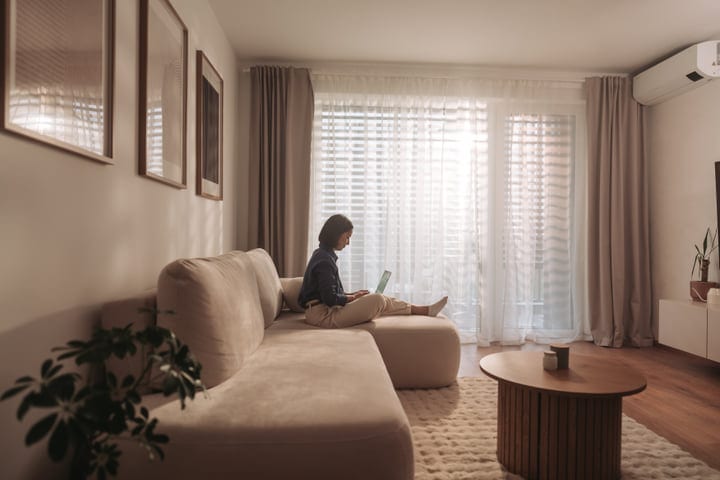 Quiet Morning Focus With Laptop On Cozy Sofa