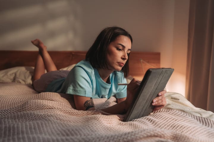 Morning Light, Digital Connection: A Woman’s Cozy Routine