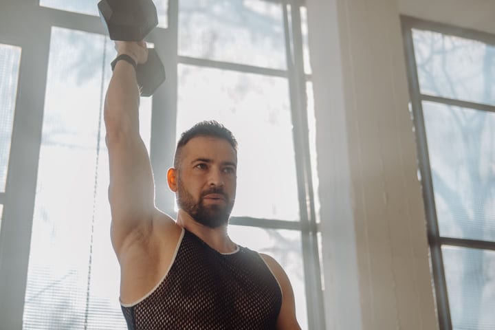 Morning Strength: A Man's Determined Workout Session