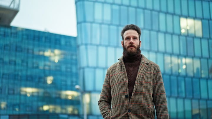 Modern Businessman Embraces Urban Morning Chill