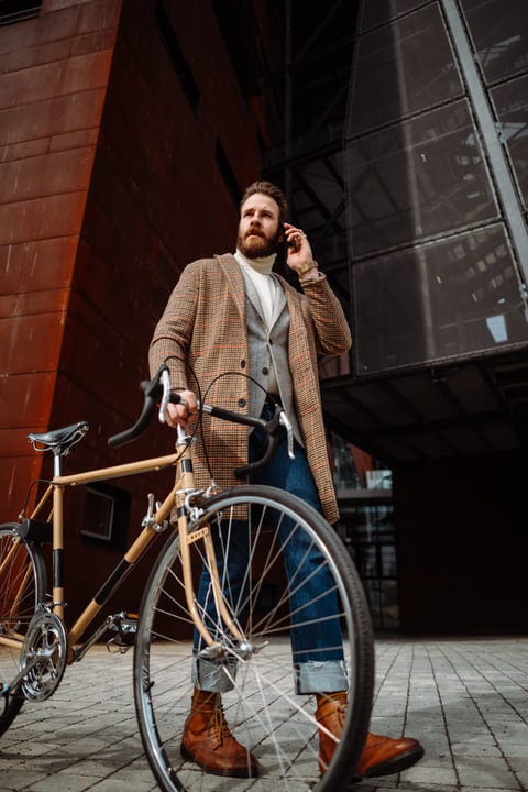 Confident Businessman Navigates Urban Commute with Style