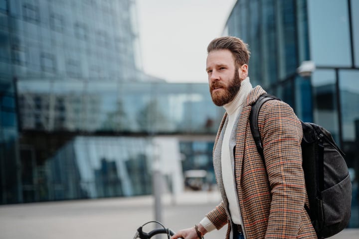 Confident Businessman Navigates His Way Through the City
