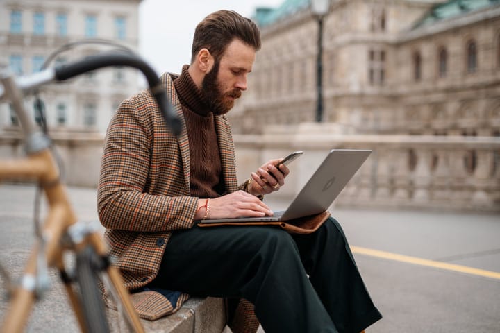 A Businessman Balances Work and Life in Urban Europe
