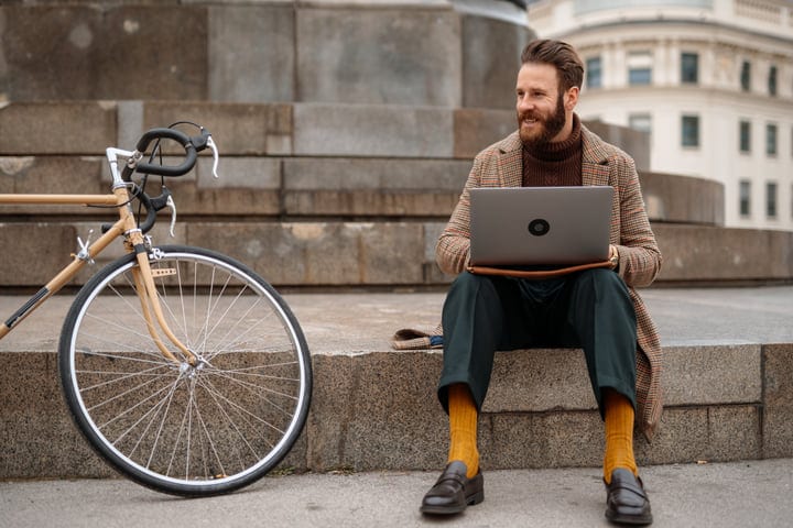 Urban Professional Finds Inspiration On City Steps With Laptop