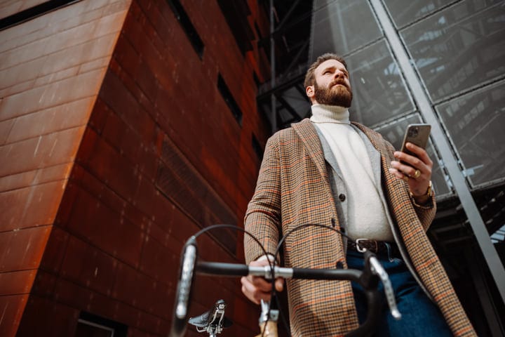 Businessman Navigates Urban Life With Style And Purpose