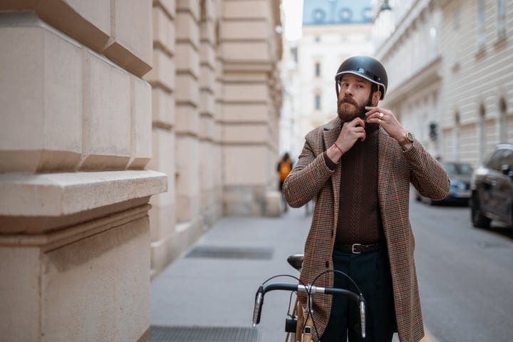 A Businessman Prepares For His Urban Bicycle Commute