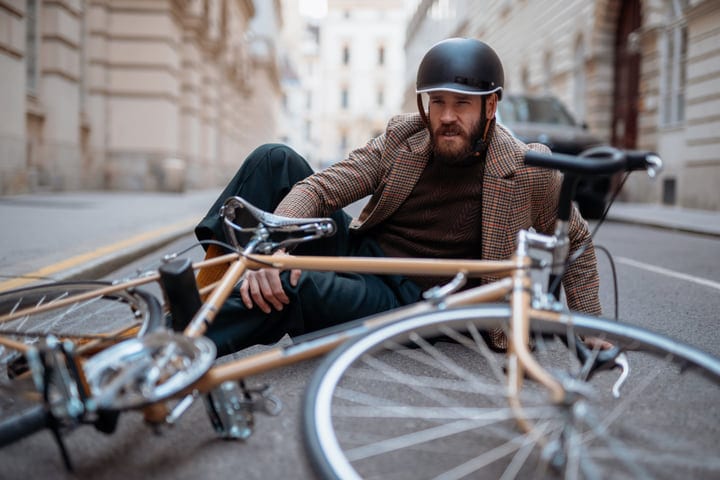 Businessman Takes A Tumble During Urban Bike Commute