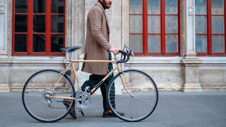 Urban Professional Glides Through City Streets On Bicycle