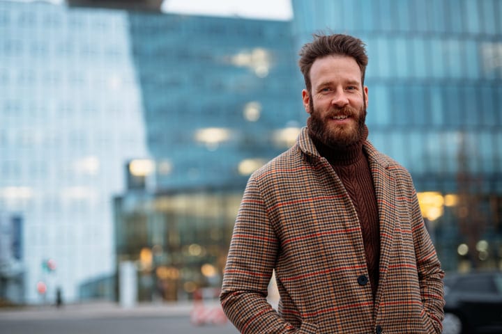 Confident Businessman Embraces Urban Winter Morning Commute