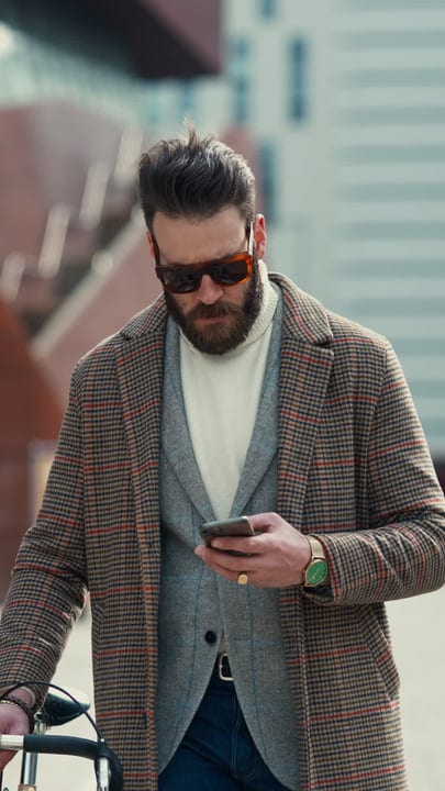 Stylish Businessman Navigates Urban Commute On Bicycle