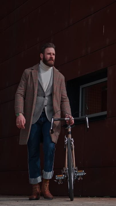 Businessman Strolls Through City Streets With Bicycle
