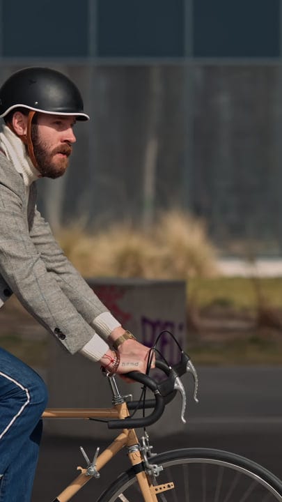 Businessman Pedals Through The City On Crisp Morning