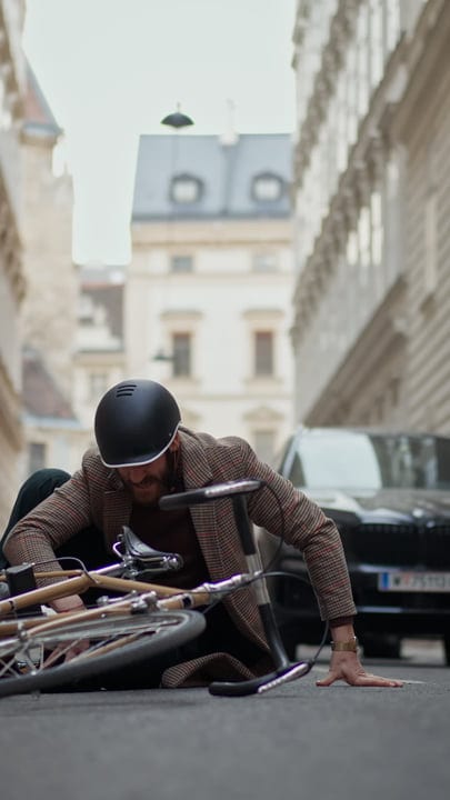 A Businessman's Unexpected Tumble On a City Street