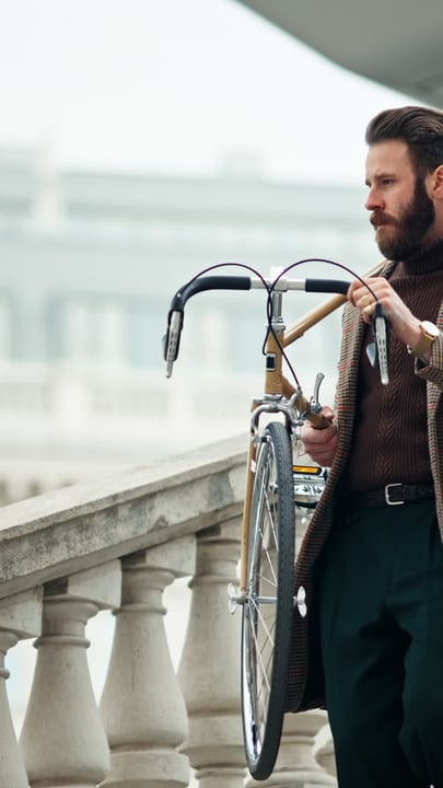 Businessman Navigates Urban Landscape With Bicycle