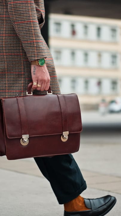 Elegance in Motion: Businessman's Urban Morning Commute