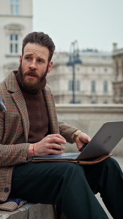 European Businessman Balances Work And Style On The Go