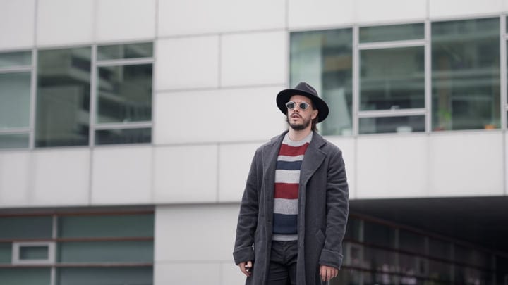 Stylish Businessman Embarks On An Urban Winter Stroll