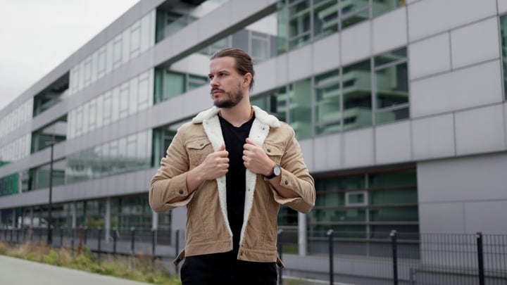 Confident Businessman Embraces The Chill Of City Streets