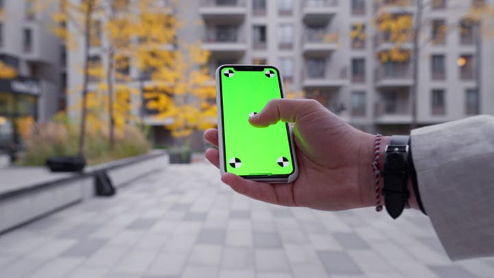 A Businessman Navigates the Urban Jungle With Technology