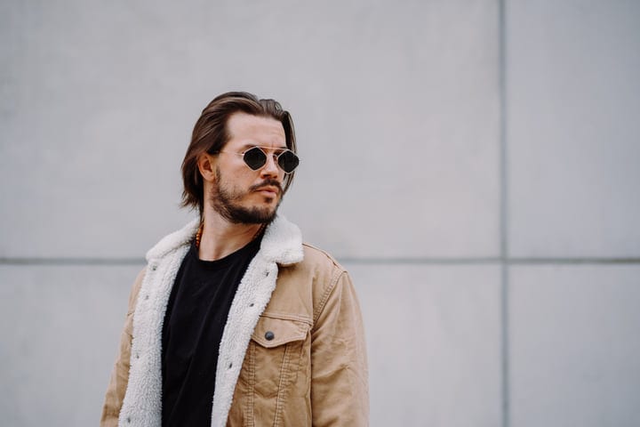Confident Businessman Embraces Style On Urban Streets