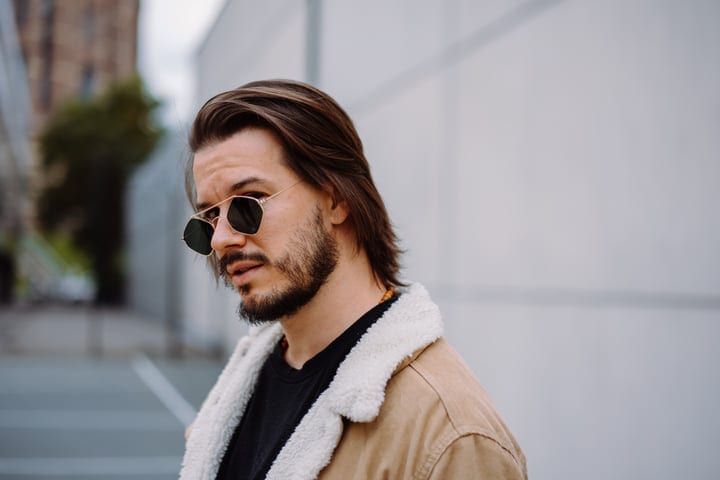Confident Businessman Embraces Autumn Chill in Style