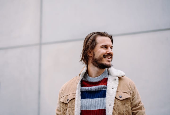 Casual Urban Stroll With A Confident Businessman