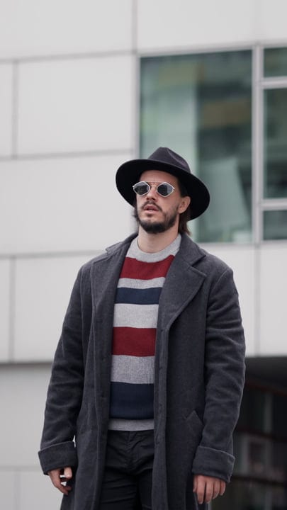 Stylish Urban Businessman Embraces A Cool Autumn Day