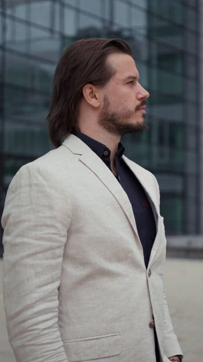Confident Businessman Embraces City Life in Style