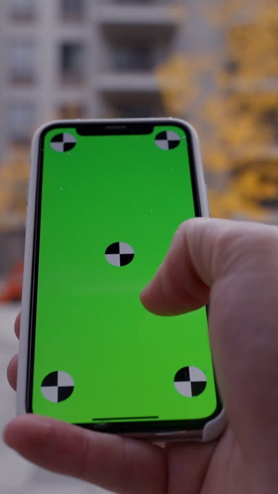 Businessman Engages with Technology During Urban Walk