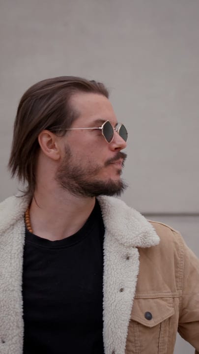 Stylish Businessman Gazing on a Crisp Urban Day